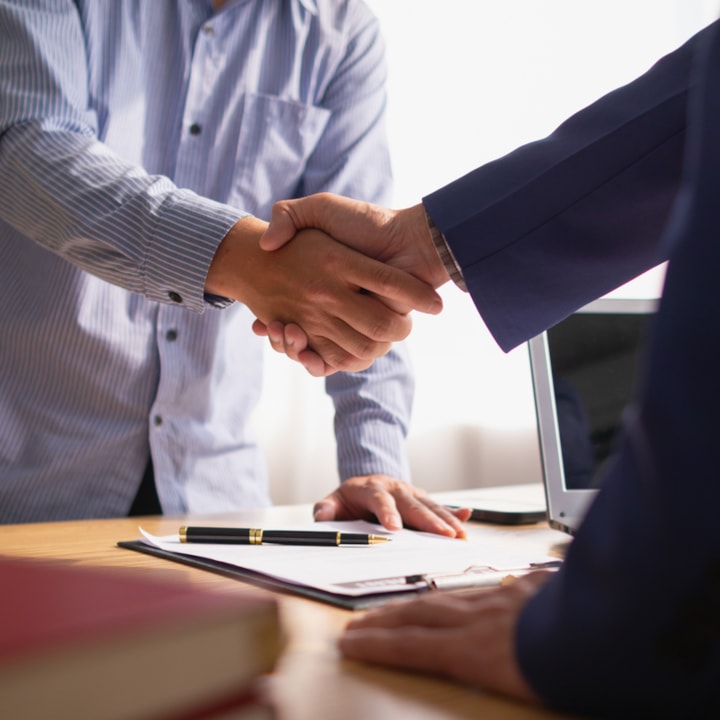 Business people shaking hands